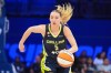 Dallas Wings guard Paige Bueckers dribbles during the second half of a WNBA basketball game against the Los Angeles Sparks in Arlington, Texas, Thursday, Sept. 17, 2026. (AP Photo/LM Otero)
