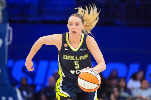 Dallas Wings guard Paige Bueckers dribbles during the second half of a WNBA basketball game against the Los Angeles Sparks in Arlington, Texas, Thursday, Sept. 17, 2026. (AP Photo/LM Otero)
