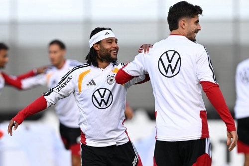 Germany's Serge Gnabry, left, and Kai Havertz attend a training session in Herzogenaurach, Germany, Tuesday Sept. 22, 2026, ahead of the Nations League soccer match against the Netherlands on Thursday. (Federico Gambarini/dpa via AP)