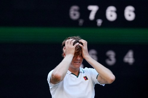 FILE - Jannik Sinner of Italy reacts after winning against Alexander Zverev of Germany in the men's singles final at Wimbledon Tennis Championships in London, Sunday, July 12, 2026. (AP Photo/Kirsty Wigglesworth, File)