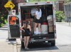 People load belongings onto a truck on Quebec's unofficial moving day in Montreal, Wednesday, July 1, 2026. THE CANADIAN PRESS/Graham Hughes
