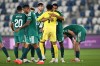 Northern Ireland's Shea Charles embraces Northern Ireland's goalkeeper Pierce Charles, back to a camera, celebrating after scoring his side's opening goal during the Nations League soccer match between Georgia and Northern Ireland in Tbilisi, Georgia, Friday, Sept. 25, 2026. (AP Photo/Tamuna Kulumbegashvili)