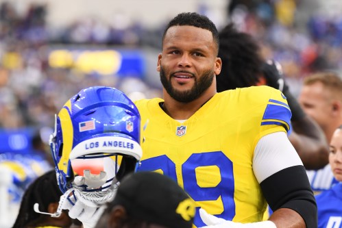 Los Angeles Rams defensive end Aaron Donald looks on from the bench before an NFL football game against the New York Giants in Inglewood, Calif., Monday, Sept. 21, 2026. (AP Photo/Katie Chin)