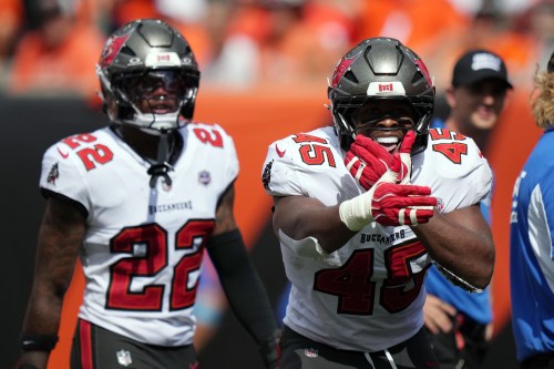 Tampa Bay Buccaneers linebacker Josiah Trotter (45) celebrates after scoring a touchdown on a pass interception against the Cincinnati Bengals in the second half of an NFL football game Sunday, Sept. 13, 2026, in Cincinnati. (AP Photo/Joshua A. Bickel)