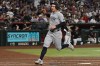 New York Yankees Anthony Volpe scores during the fifth inning of a baseball game against the Arizona Diamondbacks, Saturday, Sept. 19, 2026, in Phoenix. (AP Photo/Caitlin O'Hara)