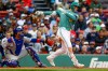 Boston Red Sox' Roman Anthony hits a triple during the seventh inning of the first baseball game of a doubleheader against the Chicago Cubs, Friday, Sept. 25, 2026, in Boston. (AP Photo/Greg M. Cooper)