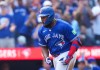 Toronto Blue Jays first baseman Vladimir Guerrero Jr. reacts after hitting a solo home run and his first of the season at home while playing against the Baltimore Orioles during fifth inning American League MLB baseball action in Toronto on Sunday, Sept. 13, 2026. THE CANADIAN PRESS/Nathan Denette