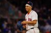 Boston Red Sox pitcher Jedixson Paez smiles after walking off the mound during the seventh inning of the second baseball game of a doubleheader against the Chicago Cubs, Friday, Sept. 25, 2026, in Boston. (AP Photo/Greg M. Cooper)
