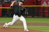 Arizona Diamondbacks' Corbin Burnes pitches during the first inning of a baseball game against the New York Yankees, Sunday, Sept. 20, 2026, in Phoenix. (AP Photo/Caitlin O'Hara)