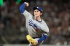 Los Angeles Dodgers pitcher Roki Sasaki throws against the San Francisco Giants during the eighth inning of a baseball game, Friday, Sept. 25, 2026, in San Francisco. (AP Photo/Jeff Chiu)