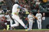 Athletics' Lawrence Butler hits an RBI single on a fielder's choice during the sixth inning of a baseball game against the Houston Astros, Friday, Sept. 25, 2026, in West Sacramento, Calif. (AP Photo/Sara Nevis)
