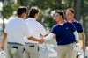 USA teams' Jackson Koivun and Justin Thomas, right, greet International teams' Sungjae Im, of South Korea, left, and Min Woo Lee, of Australia, after their Presidents Cup golf tournament third round four-ball match at Medinah Country Club, Saturday, Sept. 26, 2026, in Medinah, Ill. (AP Photo/Chris Carlson)