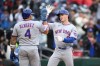 New York Mets' A.J. Ewing, right, celebrates his three-run home run with Francisco Alvarez (4) during the seventh inning of a baseball game against the Washington Nationals, Saturday, Sept. 26, 2026, in Washington. (AP Photo/Nick Wass)
