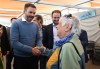 Parti Québécois Leader Paul St-Pierre Plamondon meets a convinced sovereigns, Helene Morin while visiting a local market in Quebec City, Saturday, Sept. 26, 2026. Quebecers are going to the polls for a provincial election on Oct. 5. THE CANADIAN PRESS/Jacques Boissinot
