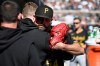 Pittsburgh Pirates starting pitcher Kirby Yates, right foreground, is hugged by a teammate after being taken out of the game during the second inning of a baseball game against the Detroit Tigers, Saturday, Sept. 26, 2026, in Detroit. (AP Photo/Jose Juarez)
