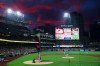 San Diego Padres starting pitcher Walker Buehler, cengter, throws to Arizona Diamondbacks' Corbin Carroll, third from left, in the fourth inning of a baseball game Saturday, Sept. 26, 2026, in San Diego. (AP Photo/Karl Anderson)