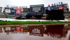Game delay announcement on the scoreboard before a baseball game between the New York Yankees and the Baltimore Orioles, Sunday, Sept. 27, 2026, in New York. (AP Photo/Noah K. Murray)