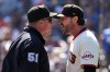 San Francisco Giants manager Tony Vitello, right, argues with umpire Marvin Hudson (51) as he is thrown out of the during the third inning of a baseball game against the Los Angeles Dodgers Sunday, Sept. 27, 2026, in San Francisco. (AP Photo/Tony Avelar)