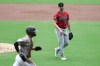 Arizona Diamondbacks starting pitcher Michael Soroka, right, looks on as San Diego Padres' Sung-Mun Song scores in the third inning of a baseball game Sunday, Sept. 27, 2026, in San Diego. (AP Photo/Karl Anderson)