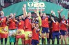 Spain's Cristina Libran, front, lifts the trophy after the Women's U20 World Cup final soccer match between Spain and North Korea in Lodz, Poland, Sunday, Sept. 27, 2026. (AP Photo/Beata Zawrzel)