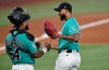 Miami Marlins Sandy Alcantara, right, celebrates beating the Atlanta Braves with catcher Brian Navarreto after the ninth inning of a baseball game, Sunday, Sept. 27, 2026, in Miami. (AP Photo/Michael Laughlin)