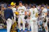 Milwaukee Brewers pitcher Jacob Misiorowski (32) shakes hands with catcher Gary Sánchez, second from left, during a pitching change in the sixth inning of a baseball game against the St. Louis Cardinals, Sunday, Sept. 27, 2026, in Milwaukee. (AP Photo/Kayla Wolf)