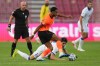 Serbia's Petar Sukacev, on the ground, watches Netherlands' Cody Gakpo control the ball during the Nations League soccer match between Serbia and the Netherlands in Belgrade, Serbia, Sunday, Sept. 27, 2026. (AP Photo/Darko Vojinovic)