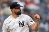 New York Yankees pitcher Carlos Rodon reacts after the final out in the top half of the seventh inning during the first baseball game of a doubleheader against the Tampa Bay Rays, Tuesday, Sept. 22, 2026, in New York. (AP Photo/Adam Hunger)