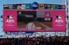 FILE - A call is overturned to a walk by the Automated Ball-Strike (ABS) Challenge System, displayed on the stadium screens, after Cincinnati Reds' Will Benson challenged at pitch result during the seventh inning of a baseball game against the Boston Red Sox in Cincinnati, March 28, 2026. (AP Photo/Carolyn Kaster, File)