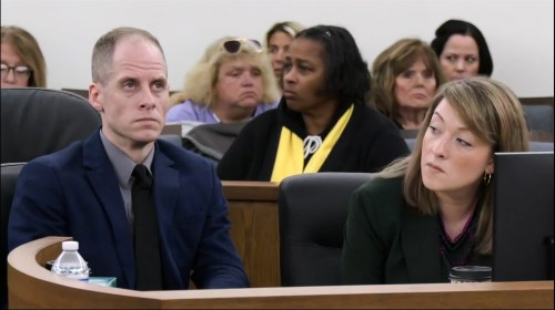 Caleb Flynn, left, sits next to Emily Smith, right, one of his attorneys on Monday, Sept. 28, 2026, in the Miami County Court of Common Pleas in Troy, Ohio. (AP Photo, Pool)