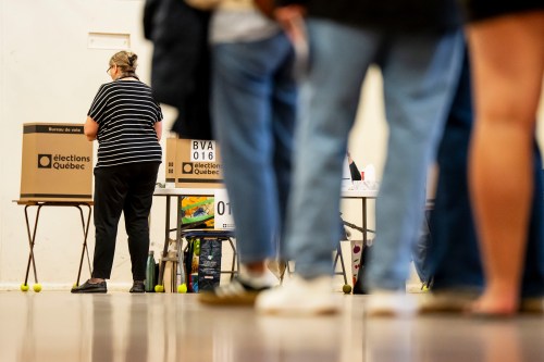 People line up to vote on the second day of advance voting, ahead of provincial elections, in Montreal on Monday, Sept. 28, 2026. THE CANADIAN PRESS/Christopher Katsarov
