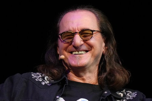 Geddy Lee holds a discussion with fellow Rush band member Alex Lifeson, as he promotes his book 