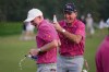 USA team captain Brandt Snedeker celebrates with assistant Jim Furyk fter their Presidents Cup golf tournament win against the International team at Medinah Country Club, Sunday, Sept. 27, 2026, in Medinah, Ill. (AP Photo/Matt Slocum)
