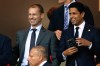 FILE - UEFA President Aleksander Ceferin, left, and Paris Saint-Germain Nasser Al-Khelaifi smile prior to the Champions League opening phase soccer match between Barcelona and Paris Saint-Germain at the Lluis Companys Olympic Stadium in Barcelona, Spain, Oct. 1, 2025. (AP Photo/Joan Monfort, File)