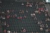 Fans sit among empty seats during the second inning in Game 1 of baseball's American League Wild Card Series between the Houston Astros and Chicago White Sox, Tuesday, Sept. 29, 2026, in Houston. (AP Photo/Karen Warren