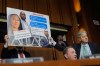 Sen. Eric Schmitt, R-Mo, seated right, with Sen. John Kennedy, R-La., standing right, during a discussion about text messages with former special counsel Jack Smith, as Smith testifies before the Senate Judiciary Committee on Capitol Hill, in Washington, Tuesday, Sept. 29, 2026, as they probe his investigation of President Trump. (AP Photo/Manuel Balce Ceneta)