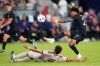 United States' Mathis Albert, right, reaches for the ball over Chile's Iván Román during the second half of an international friendly soccer match Tuesday, Sept. 29, 2026, in St. Louis. (AP Photo/Jeff Roberson)