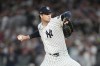 New York Yankees starting pitcher Cam Schlittler throws to the Boston Red Sox during the first inning in Game 1 of baseball's American League Wild Card Series, Tuesday, Sept. 29, 2026, in New York. (AP Photo/Frank Franklin II)