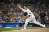 San Diego Padres pitcher Michael King (34) throws in the first inning of Game 1 of the National League Wild Card baseball playoff series against the Chicago Cubs Tuesday, Sept. 29, 2026, in San Diego. (AP Photo/Gregory Bull)