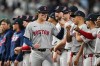 Boston Red Sox designated hitter Roman Anthony greets teammates prior to Game 1 of baseball's American League Wild Card Series against the New York Yankees, Tuesday, Sept. 29, 2026, in New York. (AP Photo/Frank Franklin II)
