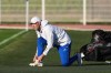 France national soccer team coach Zinedine Zidane ties his shoes during a training session in Clairefontaine-en-Yvelines west of Paris, Tuesday, Sept. 22, 2026, three days ahead of France's UEFA Nations League soccer match against Turkey. (AP Photo/Thibault Camus)