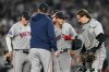Boston Red Sox starting pitcher Sonny Gray, center facing, is pulled from the game against the New York Yankees during the fifth inning in Game 2 of baseball's American League Wild Card Series, Wednesday, Sept. 30, 2026, in New York. (AP Photo/Frank Franklin II)