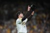 San Diego Padres pitcher Mason Miller reacts after defeating the Chicago Cubs in Game 2 of the National League Wild Card baseball playoff series Wednesday, Sept. 30, 2026, in San Diego. (AP Photo/Gregory Bull)