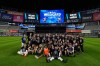 The New York Yankees take a group photo on the field to celebrate after winning baseball's American League Wild Card Series against the Boston Red Sox in Game 2, Wednesday, Sept. 30, 2026, in New York. (AP Photo/Yuki Iwamura)