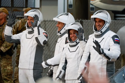 Astronauts, from left, Joshua Kutryk, of Canada, pilot Luke Delaney, commander Jessica Watkins and Cosmonaut Sergey Teteryatnikov, of Russia leave the Operations and Checkout Building at the Kennedy Space Center in Cape Canaveral, Fla., Thursday, Oct. 1, 2026. (AP Photo/Terry Renna)