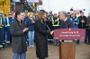 From left, Scott Burrows, CEO of the Pembina Pipeline Corp, Alberta Premier Danielle Smith and Prime Minister Mark Carney shake hands after speaking in Fort McMurray on Thursday Oct 1, 2026. Prime Minister Mark Carney declared the Pacific Link pipeline project to be in the national interest. THE CANADIAN PRESS/Greg Halinda