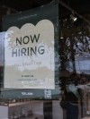 Hiring sign is displayed at a bakery in Arlington Heights, Ill., Wednesday, Sept. 30, 2026. (AP Photo/Nam Y. Huh)