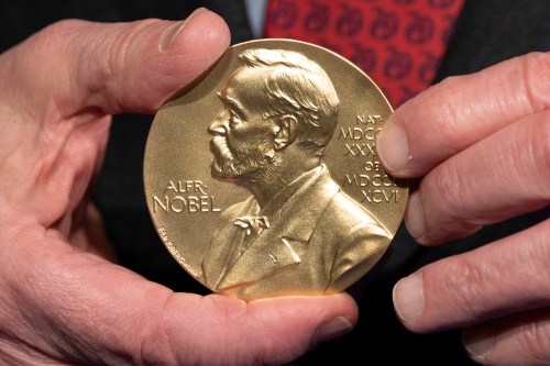 FILE - A close-up view of a Nobel Prize medal at the National Institutes of Health (NIH) in Bethesda, Md., Dec. 8, 2020. (AP Photo/Jacquelyn Martin, File)