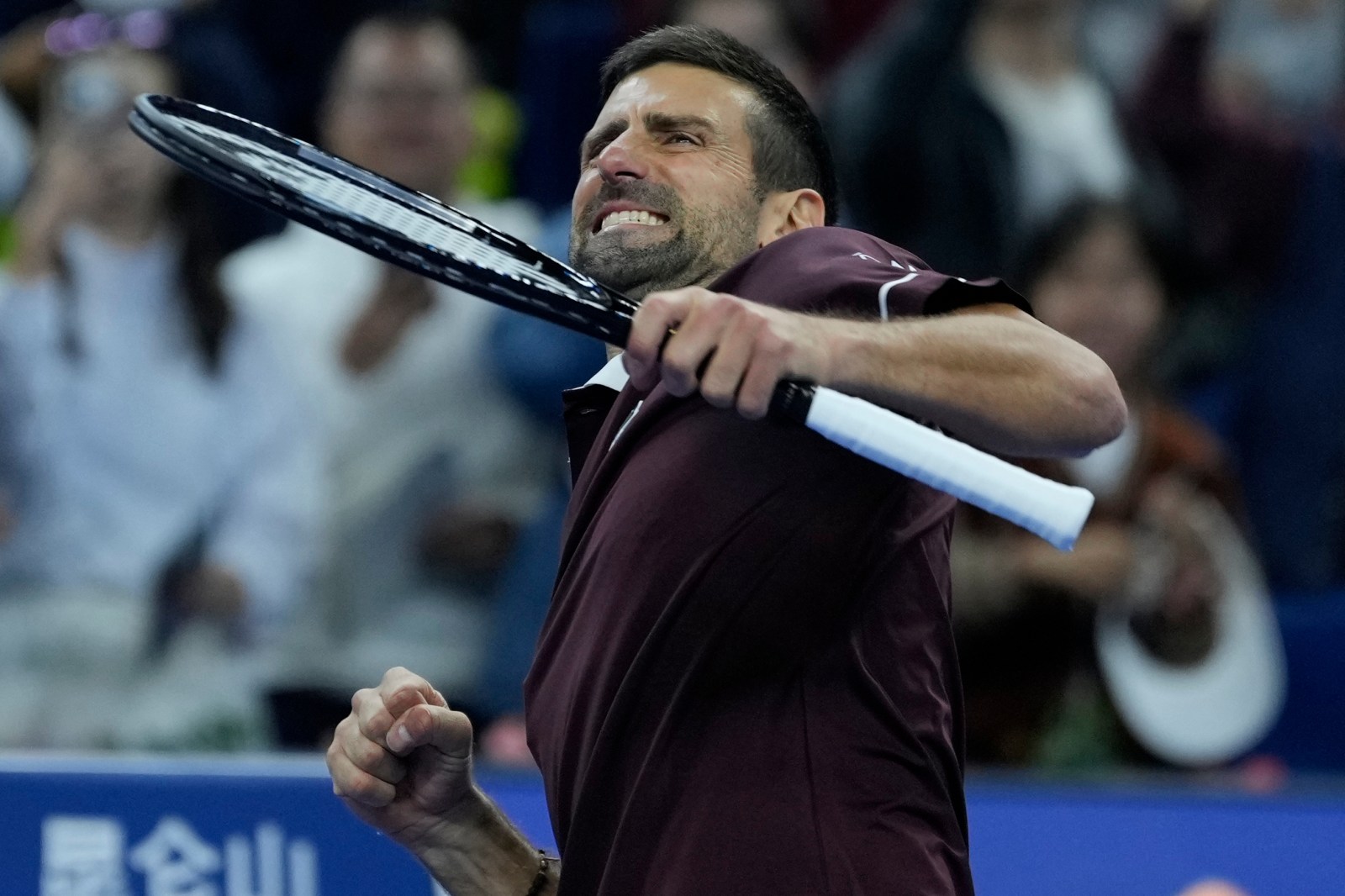 Djokovic rallies past Bu to reach China Open quarter‑finals