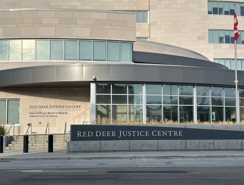 An Alberta judge has found an RCMP officer not guilty on all charges of providing info to Rwanda. The trial was conducted at the Red Deer Justice Centre courthouse is pictured in Red Deer, Alta., on Monday, Sept. 21, 2026. THE CANADIAN PRESS/Bill Graveland